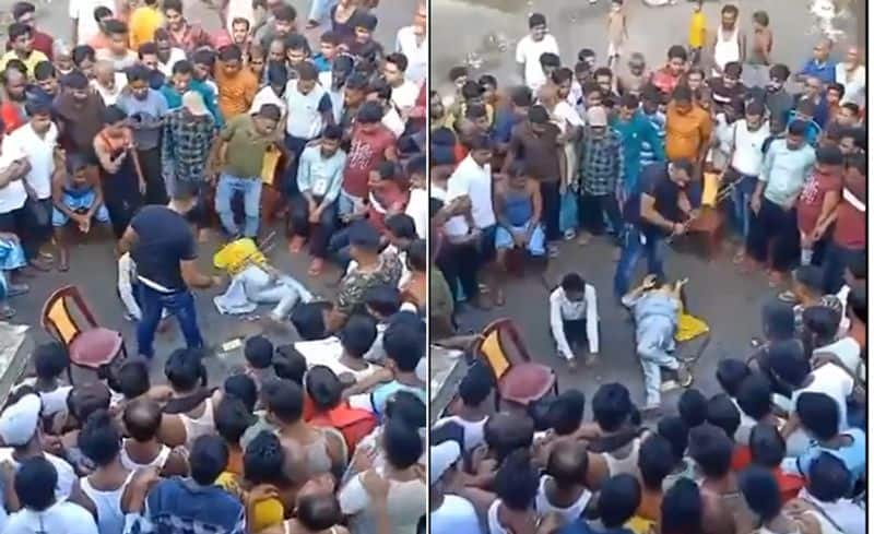 Man thrashing woman in public road in West Bengal BJP question Mamata govt law and order ckm