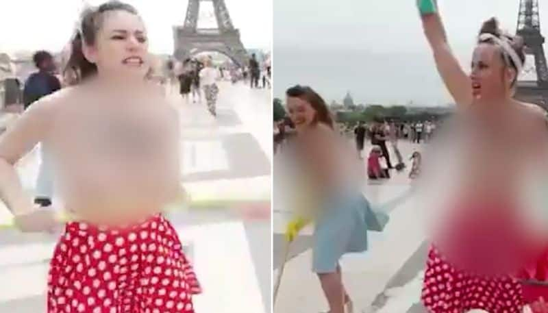 Eiffel tower protest: Topless women challenge authoritarianism with anti-fascist slogans (WATCH) AJR