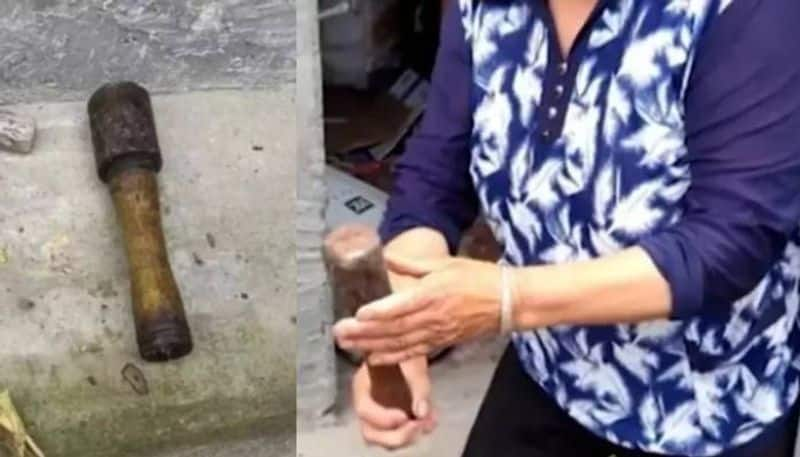 china woman using hand grenade as hammer for 20 years 