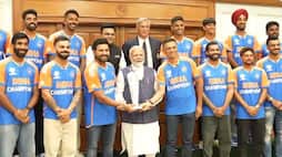 Indian Cricket team meets PM Modi t20 world cup trophy rohit sharma rahul dravid watch video zrua