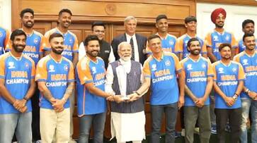 Indian Cricket team meets PM Modi t20 world cup trophy rohit sharma rahul dravid watch video zrua