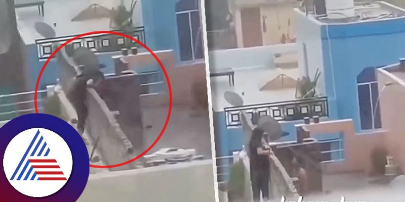 Couple secret romance in heavy rain on rooftops of building video goes viral ckm