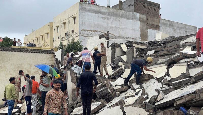 Gujarat 1 dead and many feared trapped in collapsed 6 Storey building ans