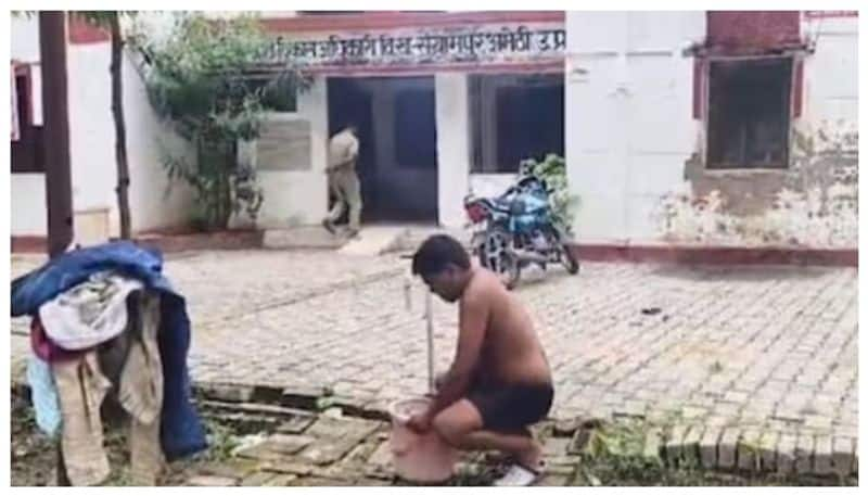 man takes a bath in front of BDOs office to protest against non-repair of drinking water pipe 