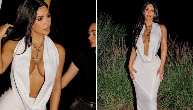 SEXY photos: Kim Kardashian poses in BOLD white dress; flaunts cleavage [PICTURES] ATG