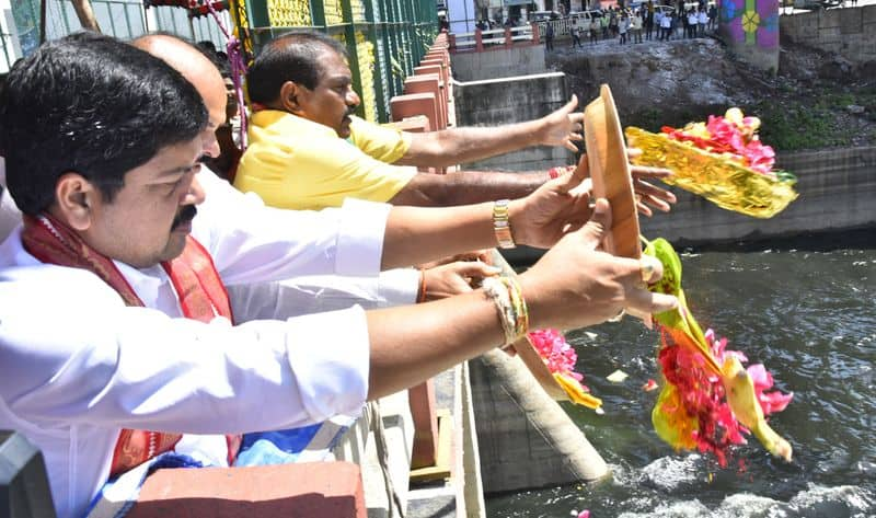 Water release from Prakasam barrage.. how many cusecs for which district..? GVR