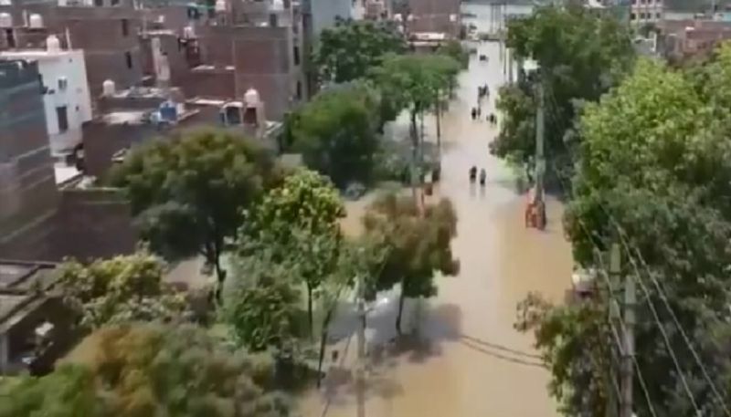 Munak canal break in Delhi: Drone footage shows Bawana residents in waist-deep flood, AAP targeted (WATCH) AJR