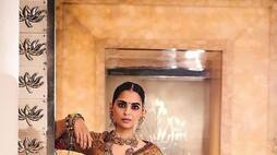 Isha Ambani wear gita  shloka written border embroidery vintage lehenga