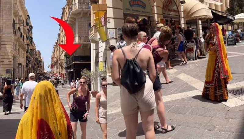 Indian woman in Lehenga Choli walking in foreign street viral video 