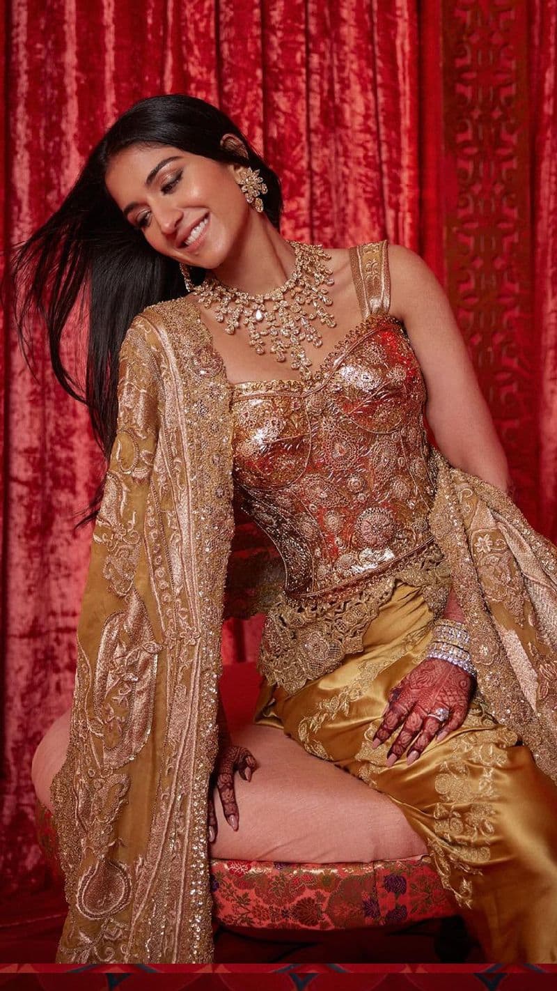 Radhika Wedding Reception Gold dress look Mangal Utsav of Anant ambani and Radhika