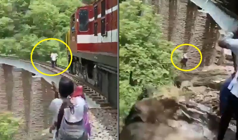 Couple jumps into 90 feet gorge from train bridge during Photoshoot to avoid Accident ckm