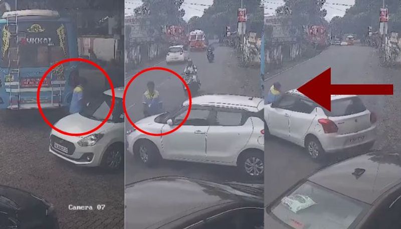 Kerala police officer Drags Petrol Pump Staffer On car Bonnet cctv footage viral mrq