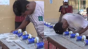  Muhammad Rashid Sets New Guinness World Record for Crushing Cans with His Head [watch]  NTI