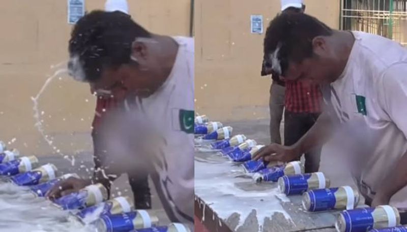 Pakistan man Muhammad Rashid crush 39 cans with his head set Guinness world record 