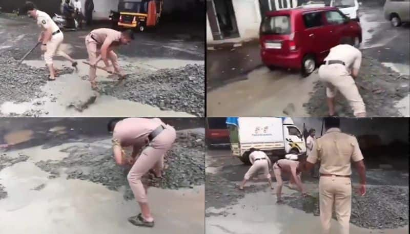 deep craters on busy highway police fill potholes video