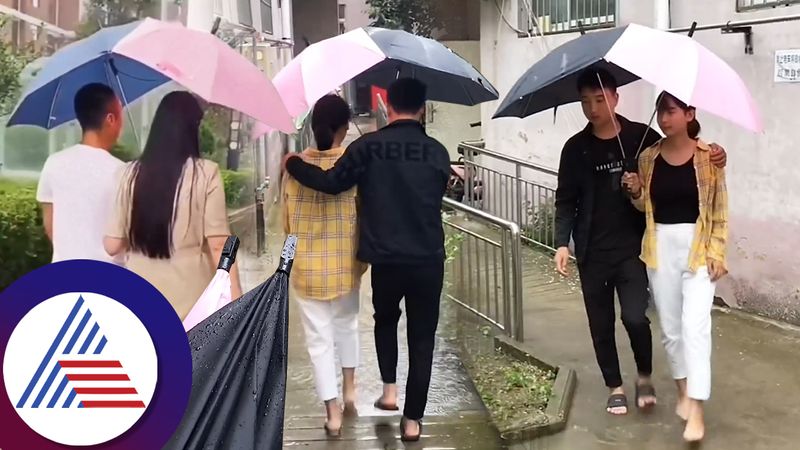 Couple umbrella introduced for rainy season goes viral netizen says waste of money ckm