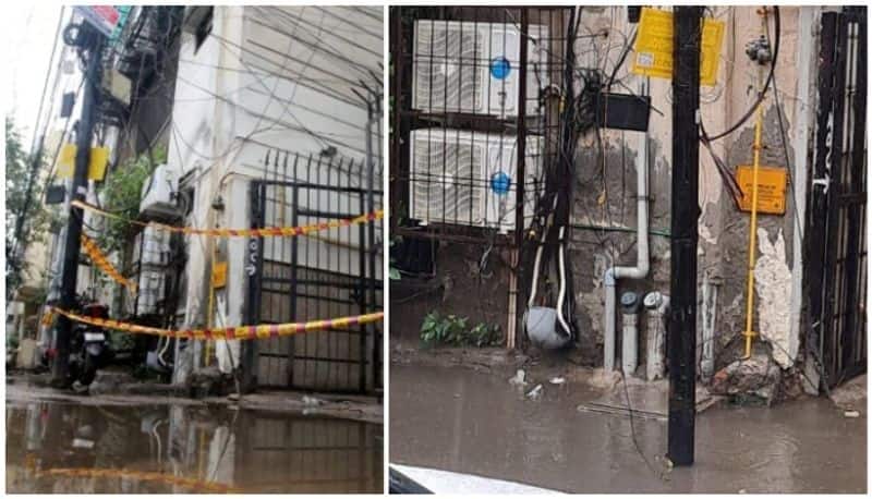 man caught iron gate to avoid stepping on the water on road but electrocuted from the gate to death