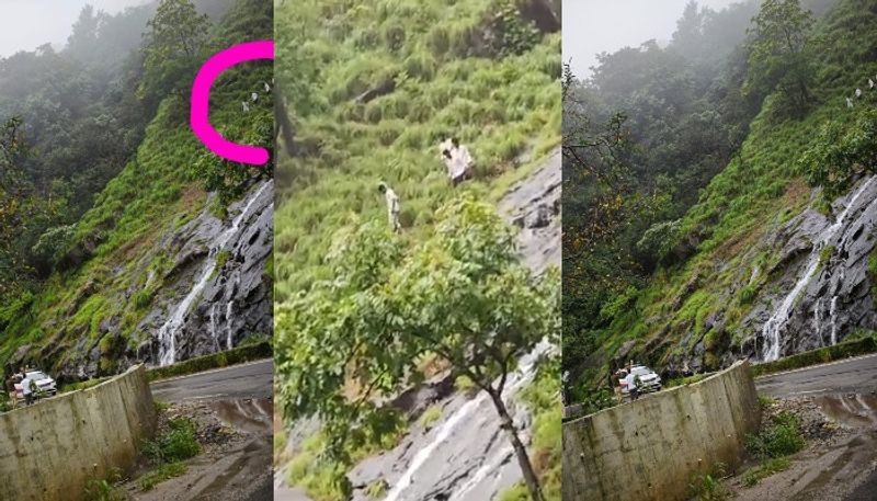 Karnataka Tourists risk lives climbing slippery rocks in Charmadi ghat for reels police impose fines vkp