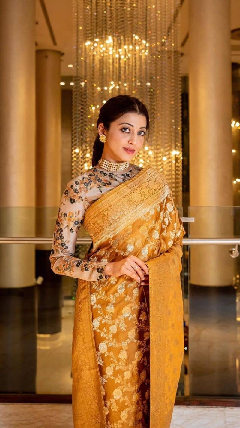 south actress  pranitha subhash pregnancy fashion outfits saree salwar suit design 