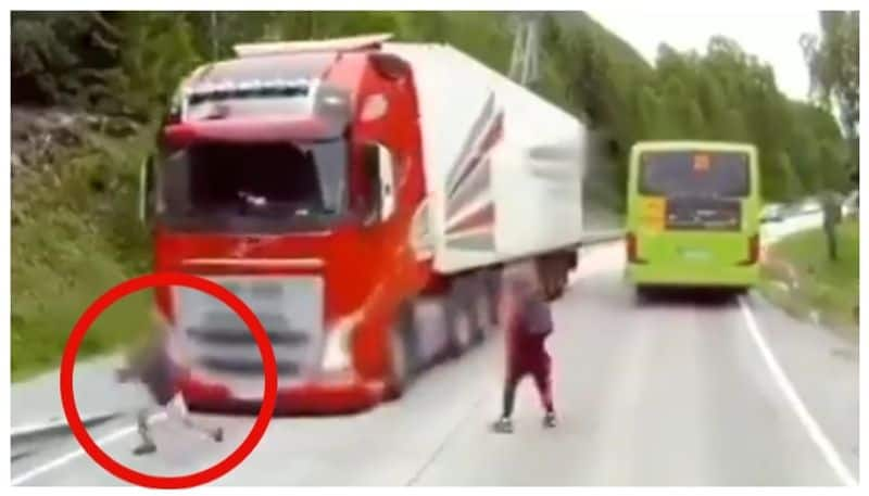 As the children crossed the road a speeding truck came crashing into them Video of that miraculous escape goes viral 