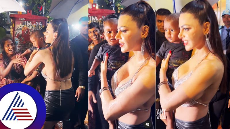 Sherlyn Chopra posed by holding child of a poor woman see childs reaction video viral suc