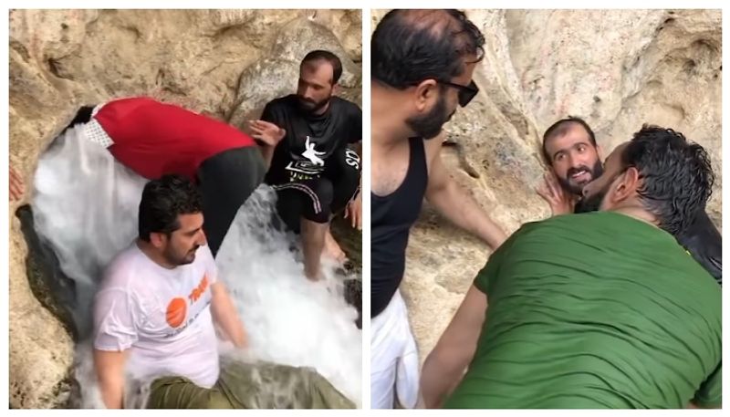 video of a tourist who entered the cave where the waterfall flows has gone viral