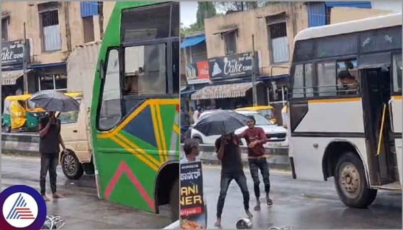 An alcoholic standing in Shivamogga to Thirthahalli main road demand for liquor sat