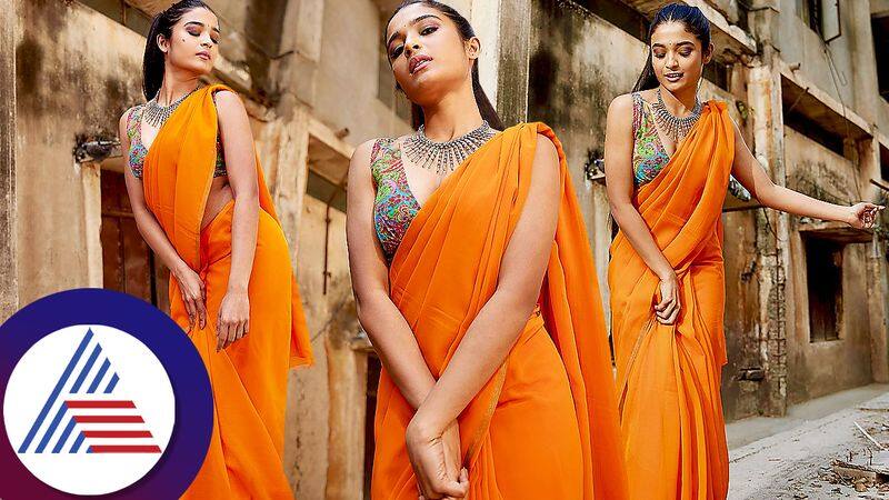 sandalwood actress Chaithra Achar stunning look in orange saree pav