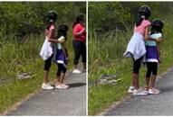 Watch: Parents endanger kids for photos next to alligator in Florida, spark outrage online NTI