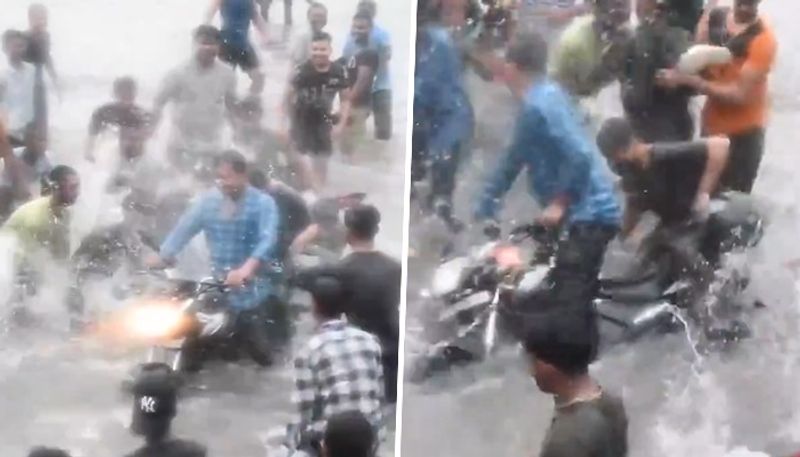 Uttar Pradesh: Mob harasses woman on flooded road; top Lucknow cops suspended (WATCH) AJR