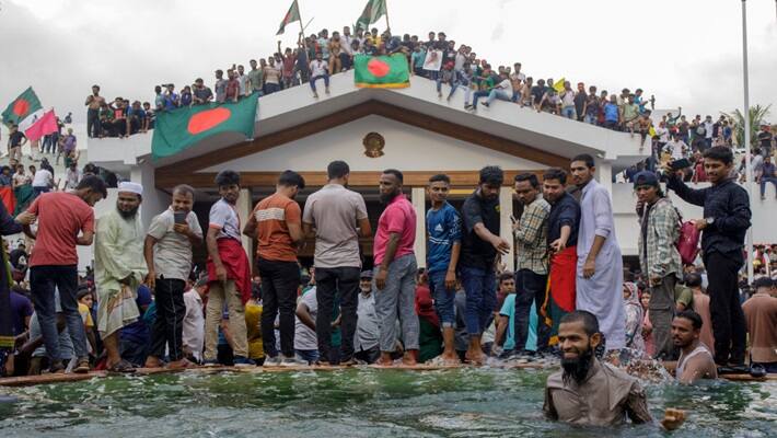 Bangladesh protester at PM palace in Dhaka