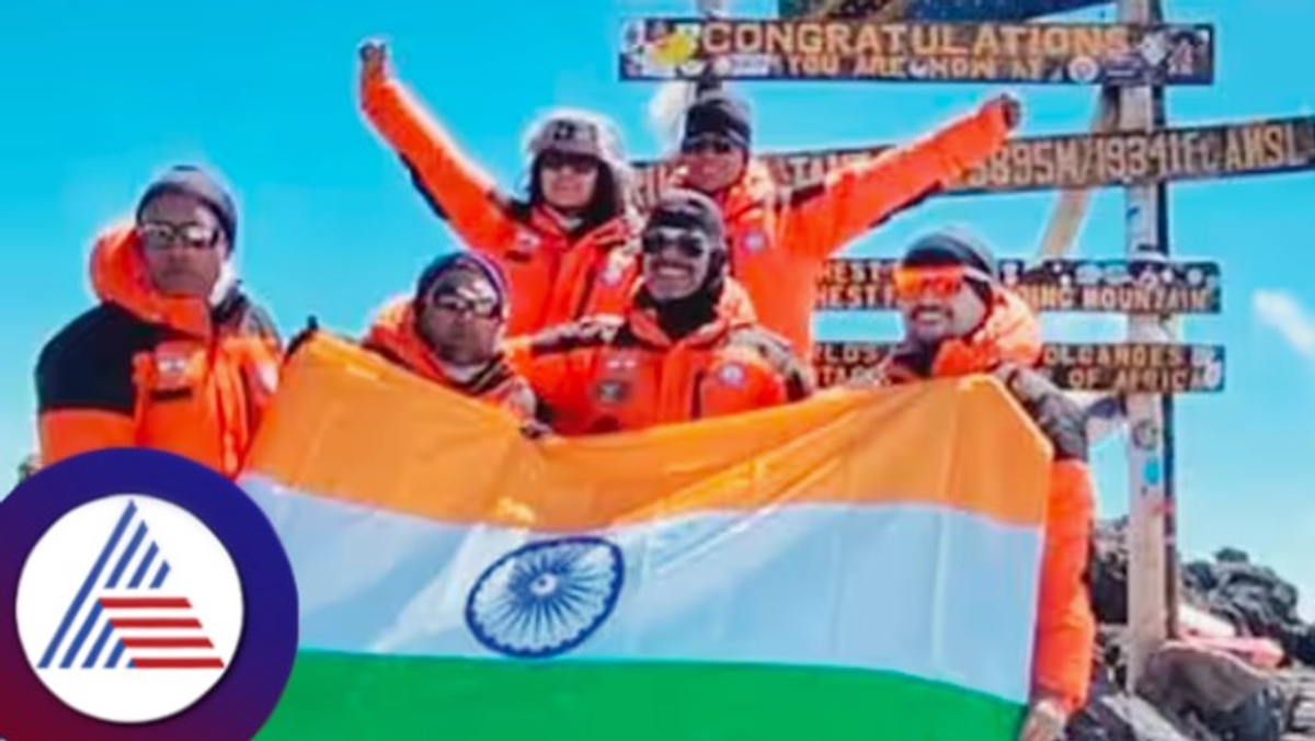 Giant indian flag unfurled atop highest peak of African continent Kilimanjaro rav