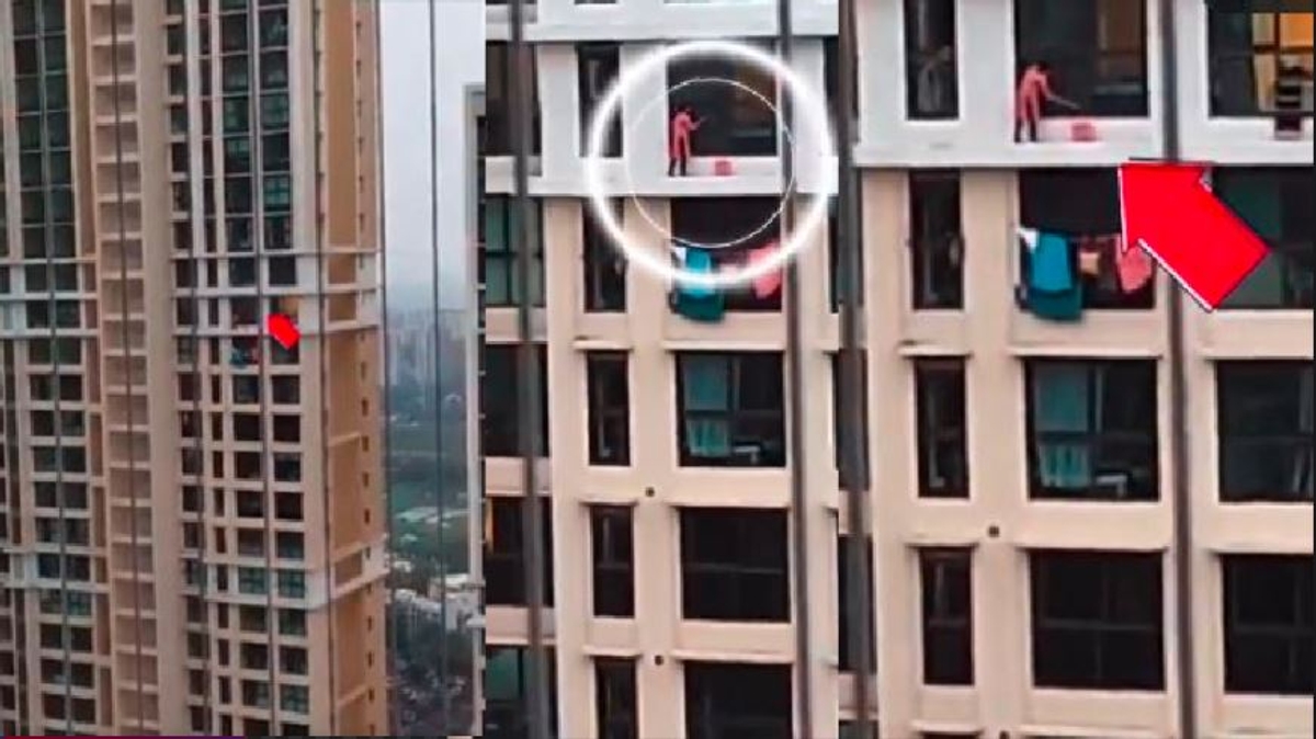 Mumbai Woman climbs over skyscraper balcony to clean window Video goes viral akb