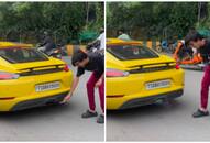 WATCH: Man uses Porsche exhaust to light cigarette: shocking results captured on video NTI