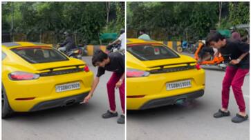 WATCH: Man uses Porsche exhaust to light cigarette: shocking results captured on video NTI