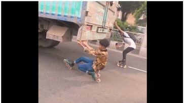 Watch: Teenagers perform dangerous skating stunt behind moving truck in Dhaka, Bangladesh NTI