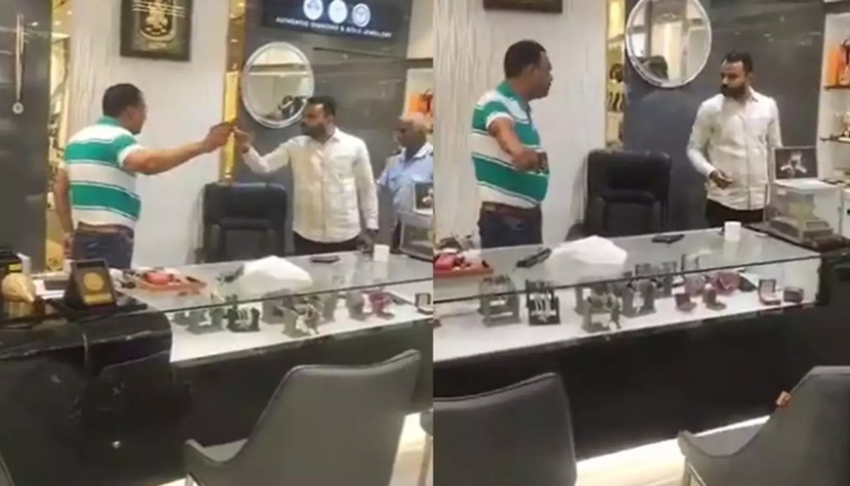 heated argument between jeweler and customer leading to brandishing of pistol to threaten 