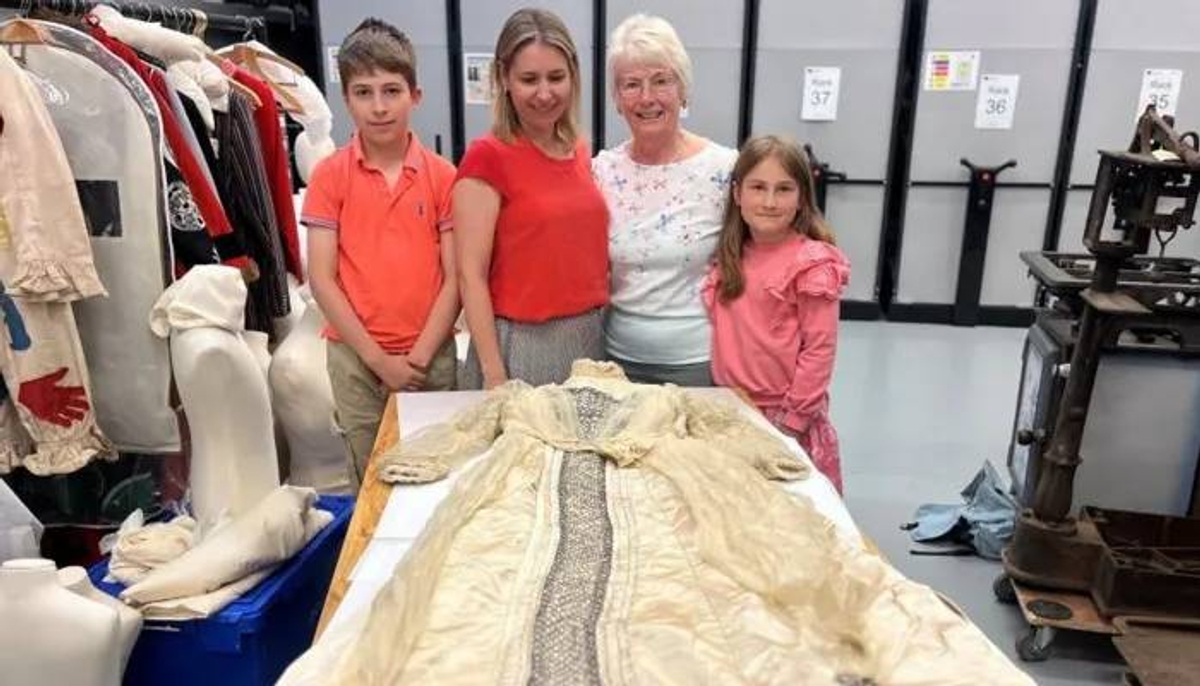 family reunited with Suffragette womans wedding dress 