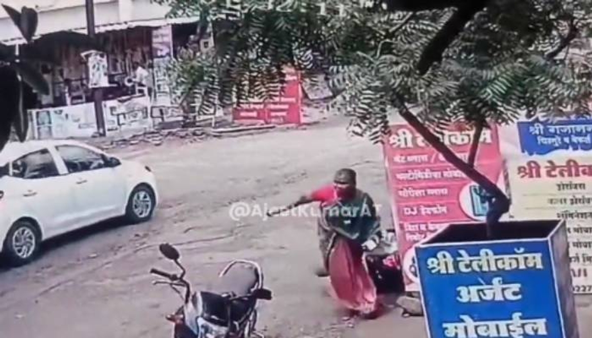 woman throws stones at sons attackers cctv footage went viral  