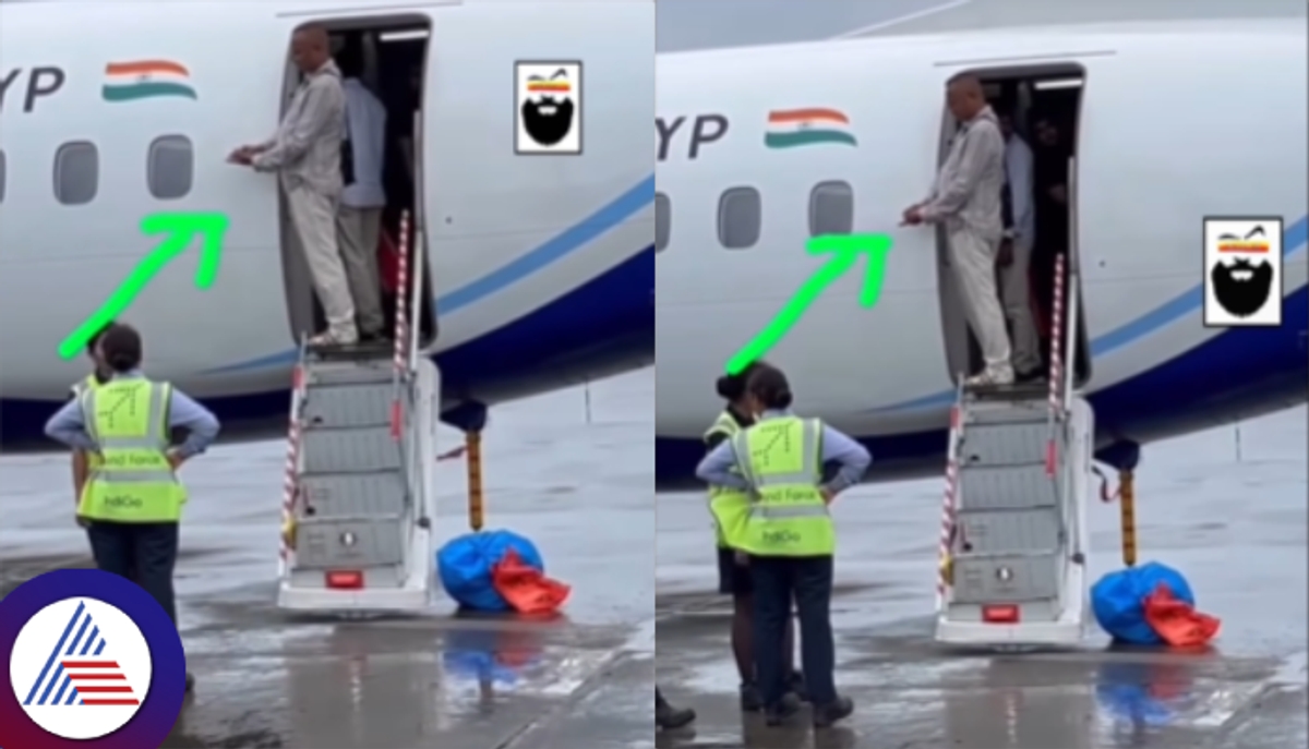 Indian Man gutka consuming in aeroplane door step video viral sat