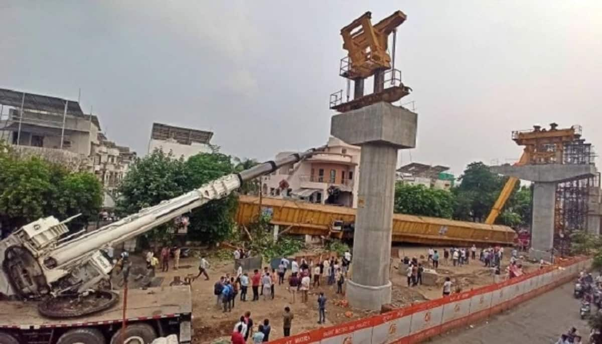 Surat Metro Work Crane falls on building during Line Construction san