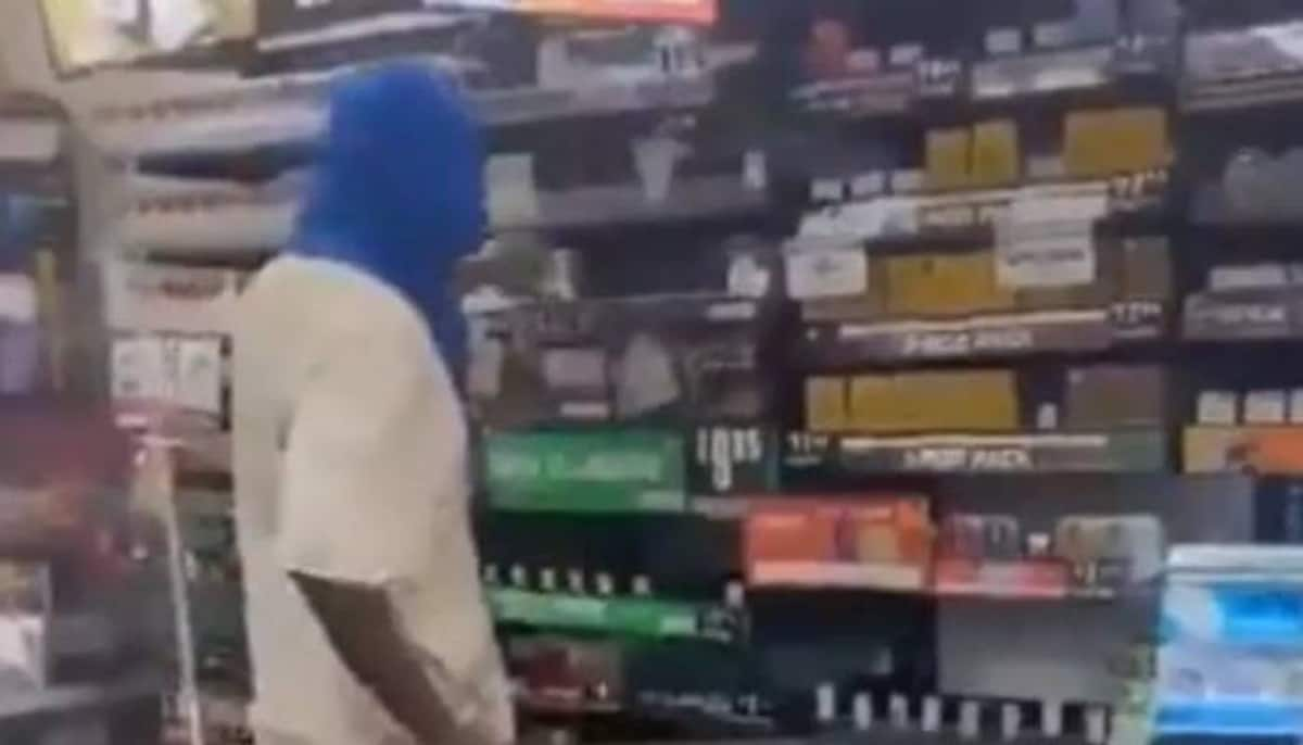 man attacking a thief with laathi in indian store viral video