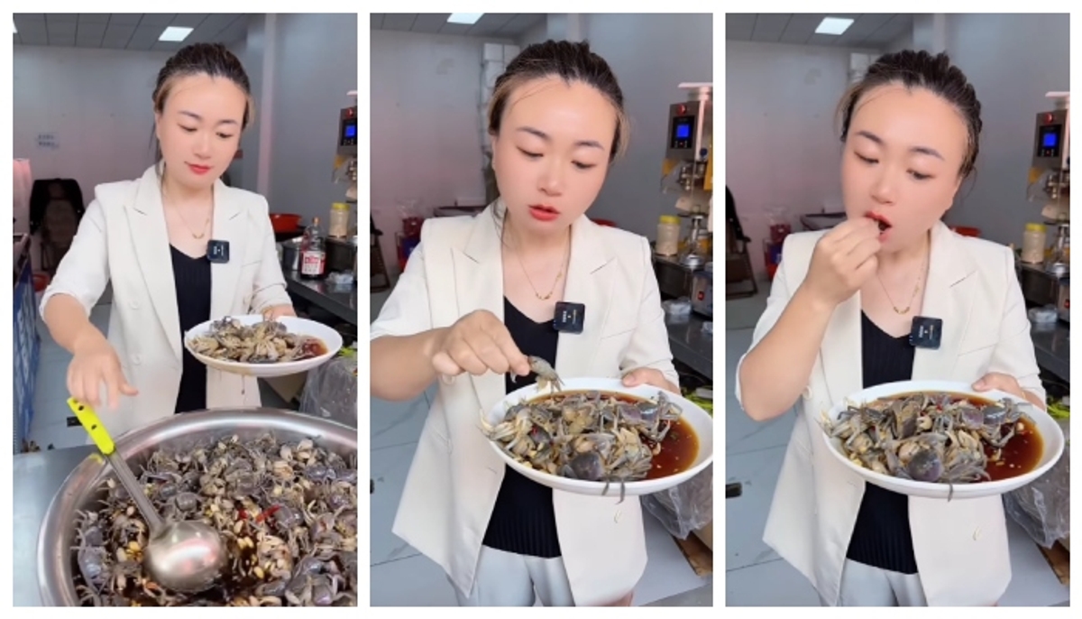 video of a young woman eating crabs alive from a plate has gone viral