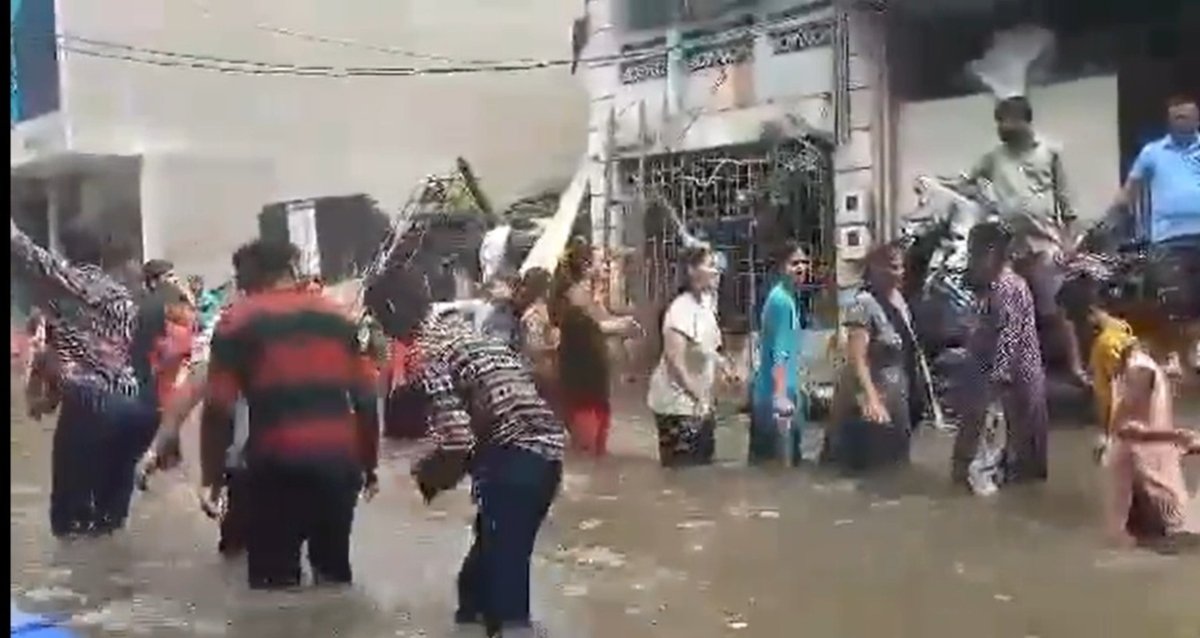 Gujarat's flooded streets turn dance floor as locals perform Garba in knee-deep water (Watch) shk