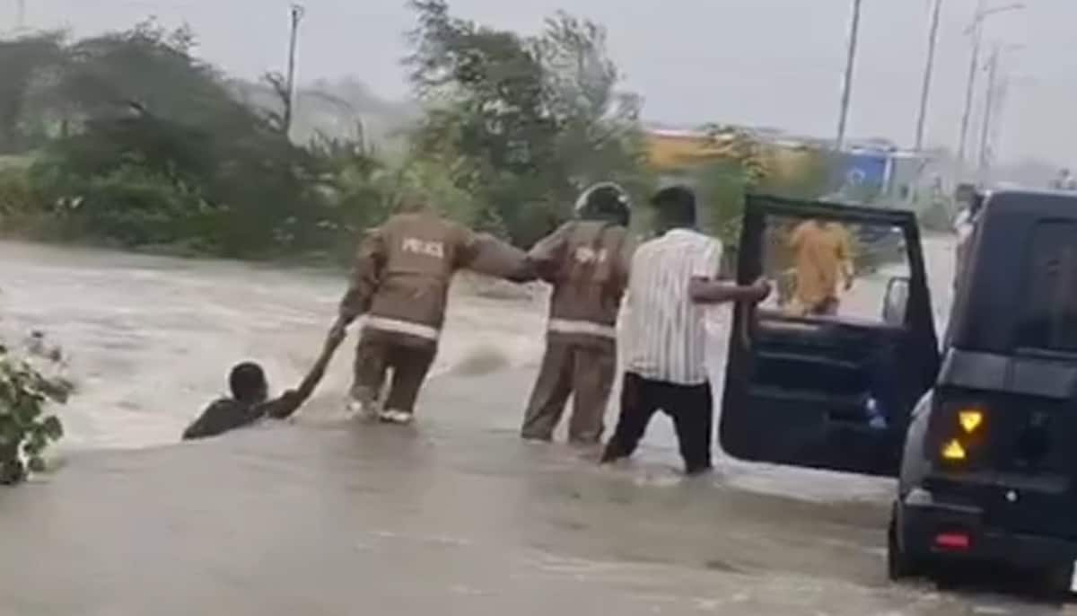 Telangana cops risk their lives to save man from flooded stream video goes viral watch gcw