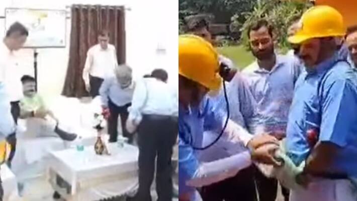 officer removes shoes fixes clothes of union minister watch here