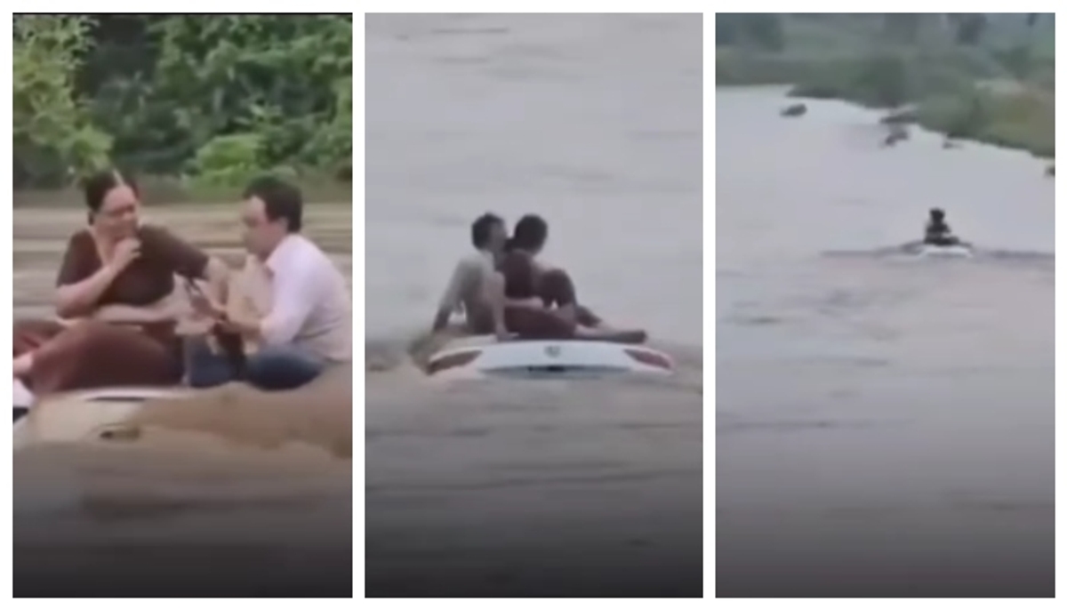 video of a couple sitting quietly on the roof of their car in a gushing river has gone viral