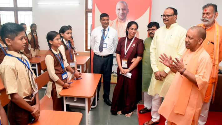 CM Yogi interacts with students at Atal Awasiya Vidyalaya in Lucknow AKP