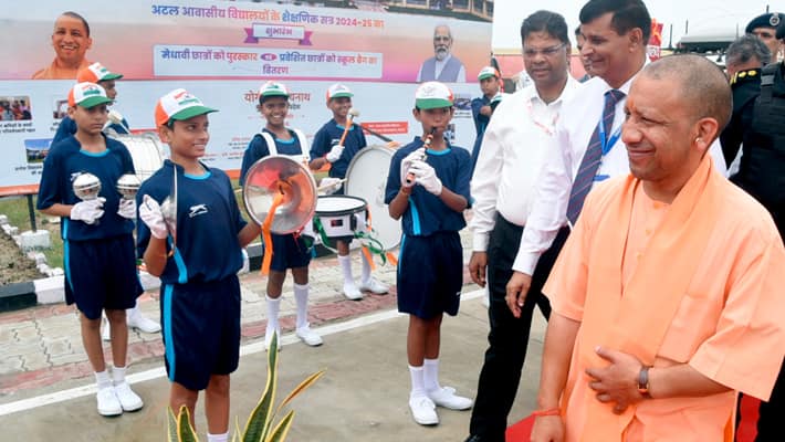 CM Yogi interacts with students at Atal Awasiya Vidyalaya in Lucknow AKP