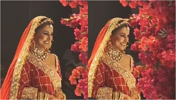 Hina Khan walks on the ramp amid breast-cancer treatment; stuns in a red bridal look - WATCH ATG